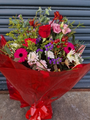 Selection of Flowers in a Yuco Vase Florist Choice